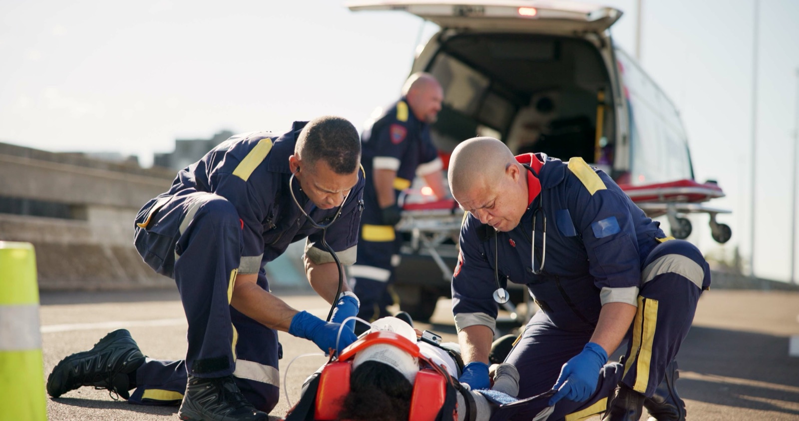 EMS providers treating a patient on a stretcher
